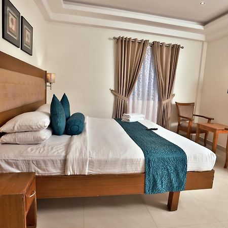 Vishnu Inn Guruvāyūr Buitenkant foto