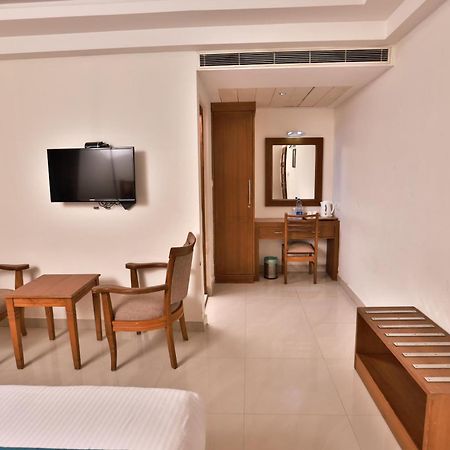 Vishnu Inn Guruvāyūr Buitenkant foto
