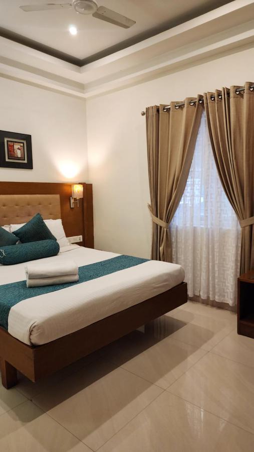 Vishnu Inn Guruvāyūr Buitenkant foto