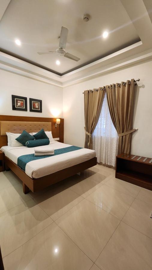 Vishnu Inn Guruvāyūr Buitenkant foto