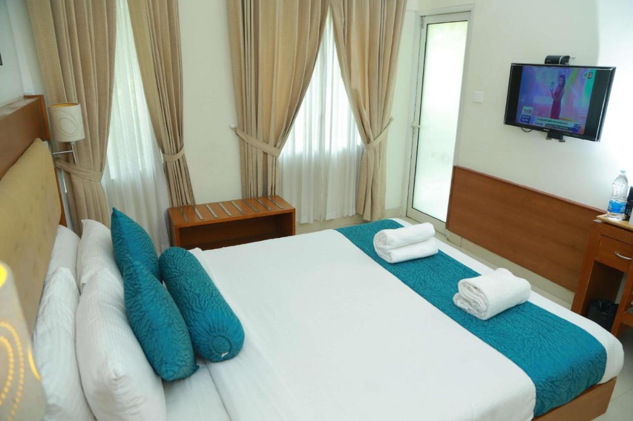 Vishnu Inn Guruvāyūr Buitenkant foto